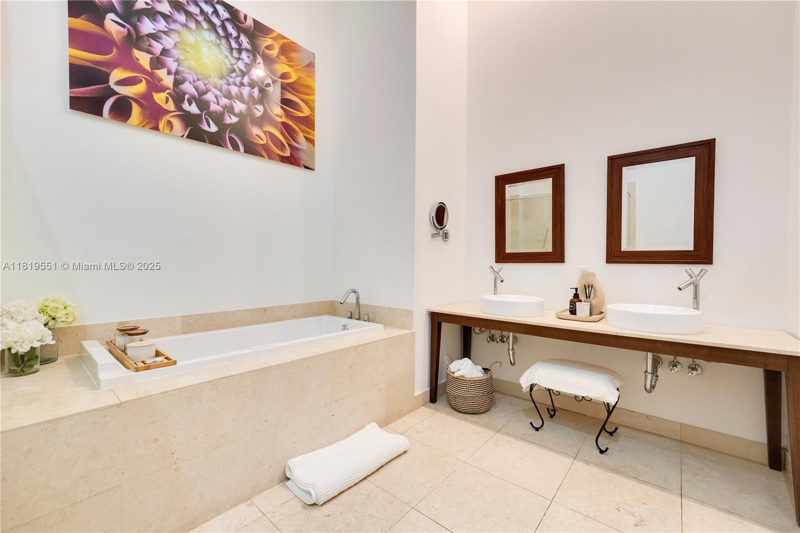 485 Brickell Avenue, Unit 4004 Miami, FL 33131 - Photo 13 of 22 a bathroom with a bathtub and a sink
