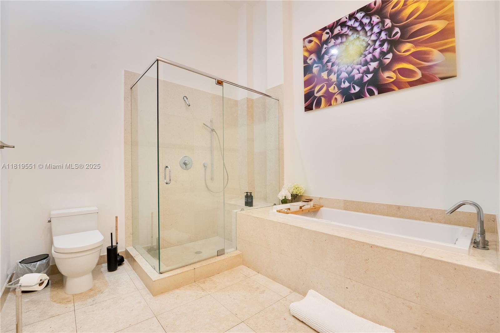 485 Brickell Avenue, Unit 4004 Miami, FL 33131 - Photo 14 of 22 a bathroom with a bathtub a toilet and a shower