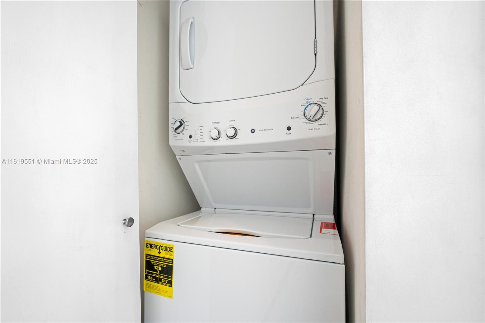 485 Brickell Avenue, Unit 4004 Miami, FL 33131 - Photo 21 of 22 a utility room with dryer and washer