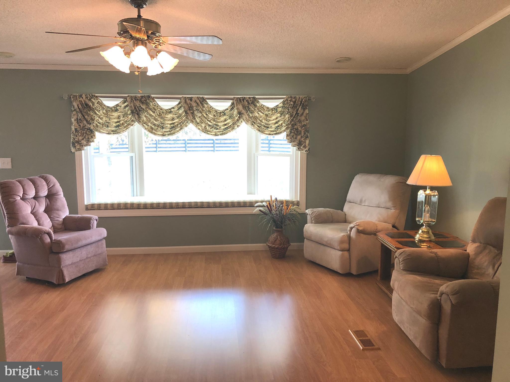 1299 Reynolds Road Cross Junction, VA 22625 - Photo 11 of 23 Spacious family room with bright bay window