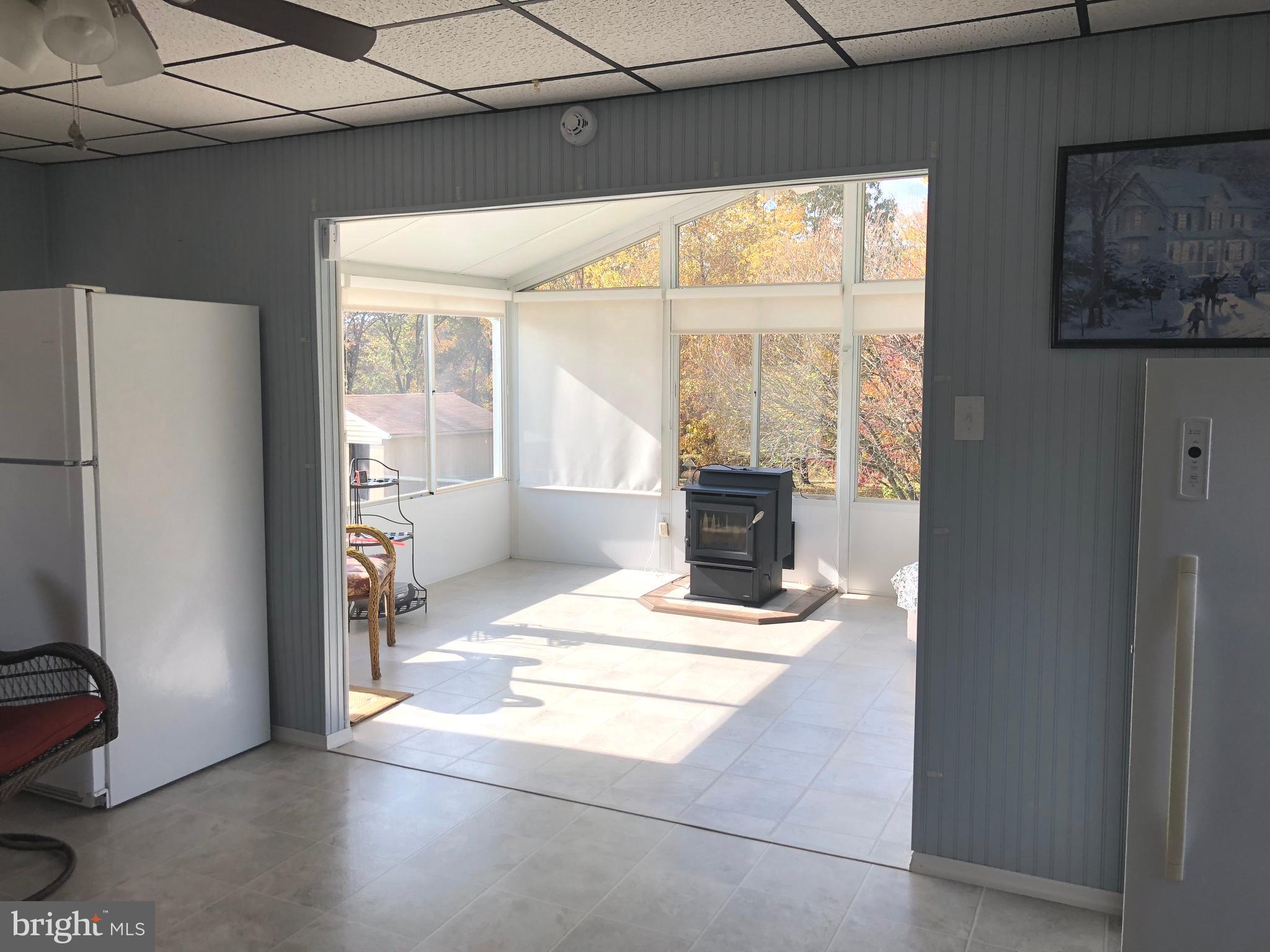 1299 Reynolds Road Cross Junction, VA 22625 - Photo 20 of 23 View into the rear sunroom