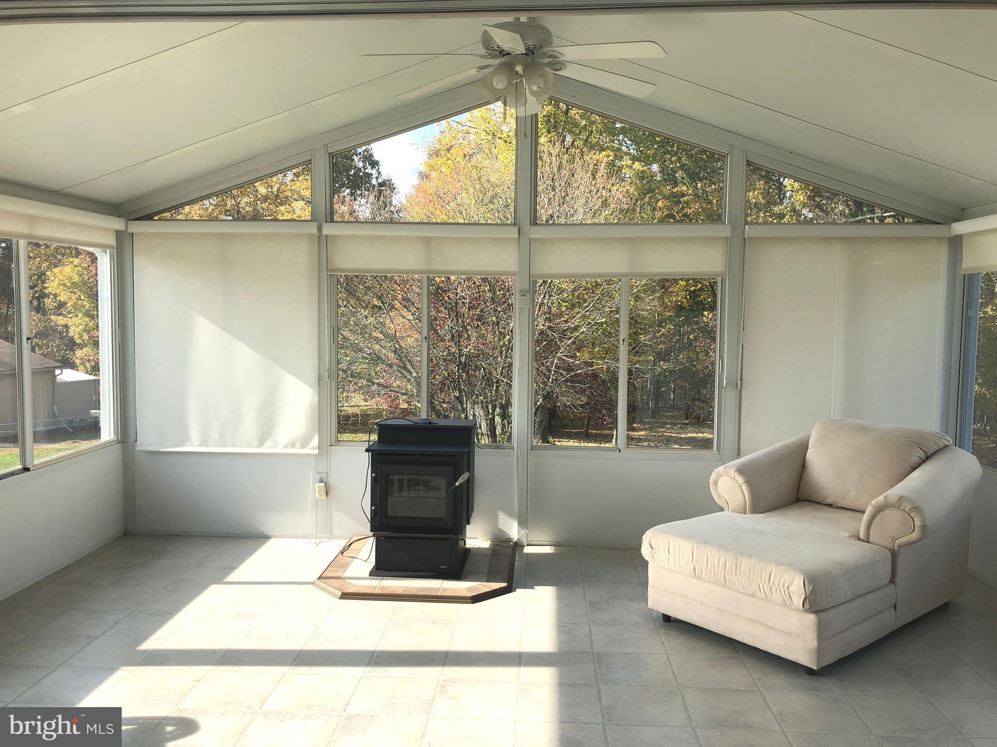 1299 Reynolds Road Cross Junction, VA 22625 - Photo 6 of 23 Watch the wildlife from this relaxing sunroom!