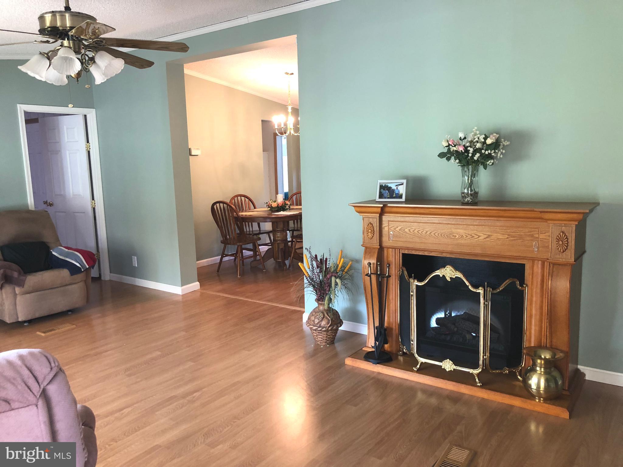1299 Reynolds Road Cross Junction, VA 22625 - Photo 10 of 23 Large family room with a beautiful fireplace