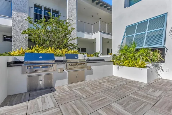 a white cabinets with outdoor space