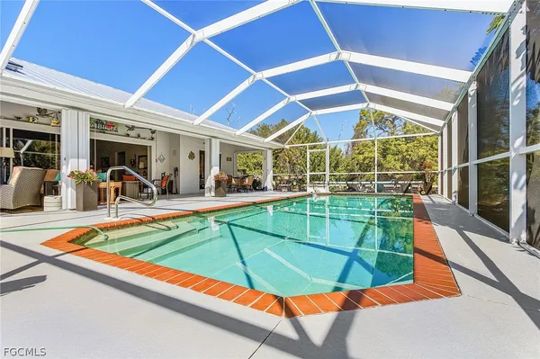 a view of a backyard with a patio
