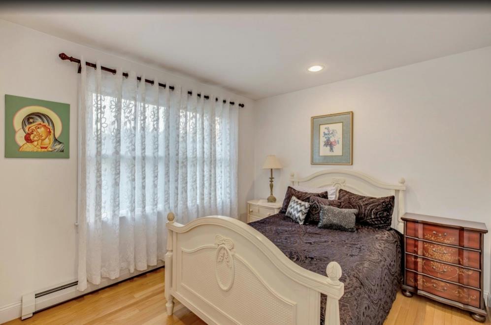 2655 Rocky Point Road East Marion, NY 11939 - Photo 12 of 23 Bedroom with recessed lighting and light wood finished floors