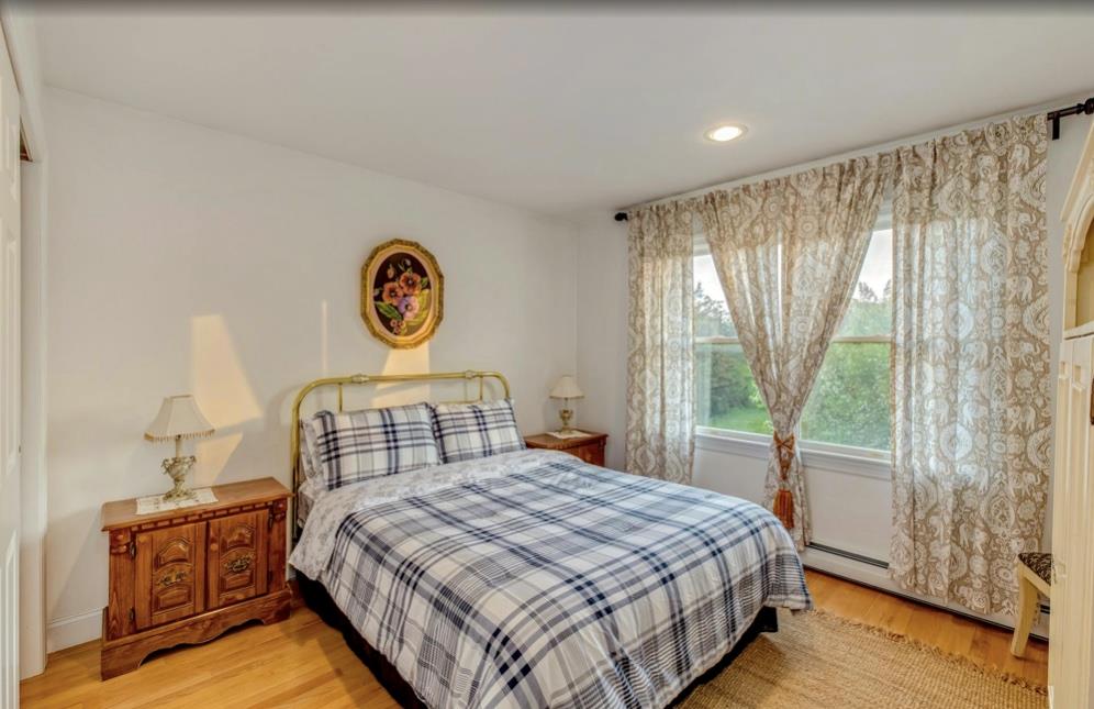 2655 Rocky Point Road East Marion, NY 11939 - Photo 14 of 23 Bedroom with recessed lighting and light wood-style flooring