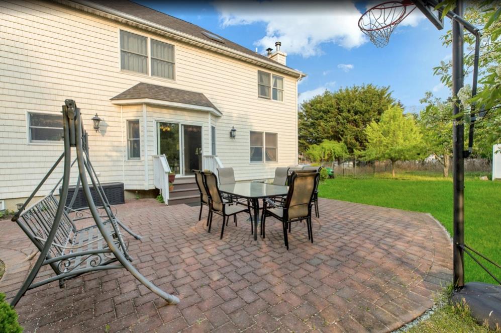 2655 Rocky Point Road East Marion, NY 11939 - Photo 15 of 23 View of patio with outdoor dining space and entry steps