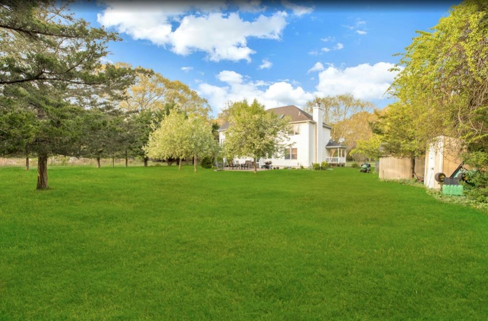 2655 Rocky Point Road East Marion, NY 11939 - Photo 17 of 23 View of yard with a shed and an outbuilding