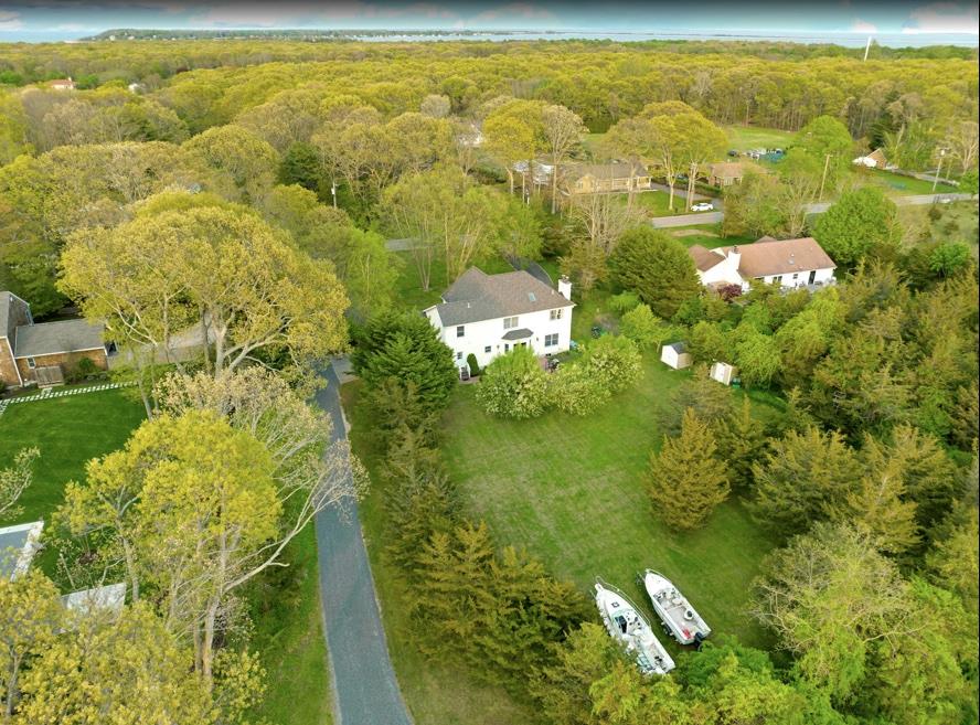 2655 Rocky Point Road East Marion, NY 11939 - Photo 22 of 23 Bird's eye view featuring a view of trees