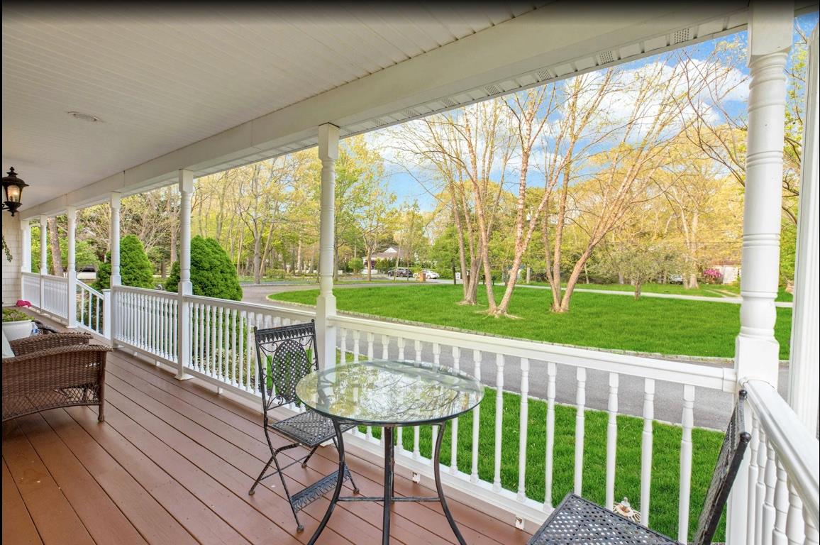 2655 Rocky Point Road East Marion, NY 11939 - Photo 3 of 23 Deck featuring covered porch and a yard