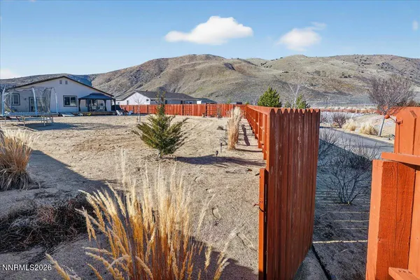 a view of balcony with furniture