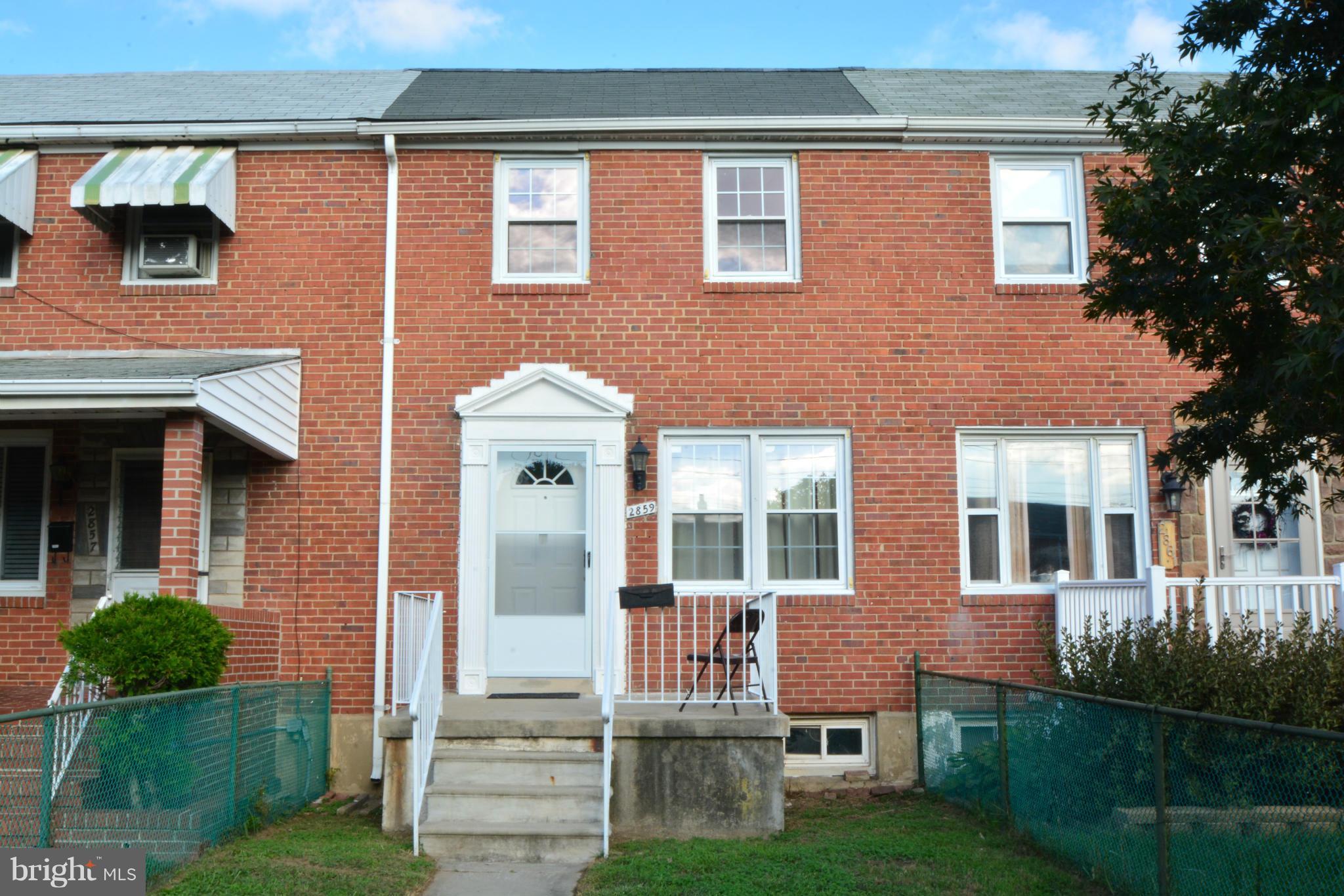 2859 Plainfield Road Dundalk, MD 21222 - Photo 1 of 24 a front view of a house with garden