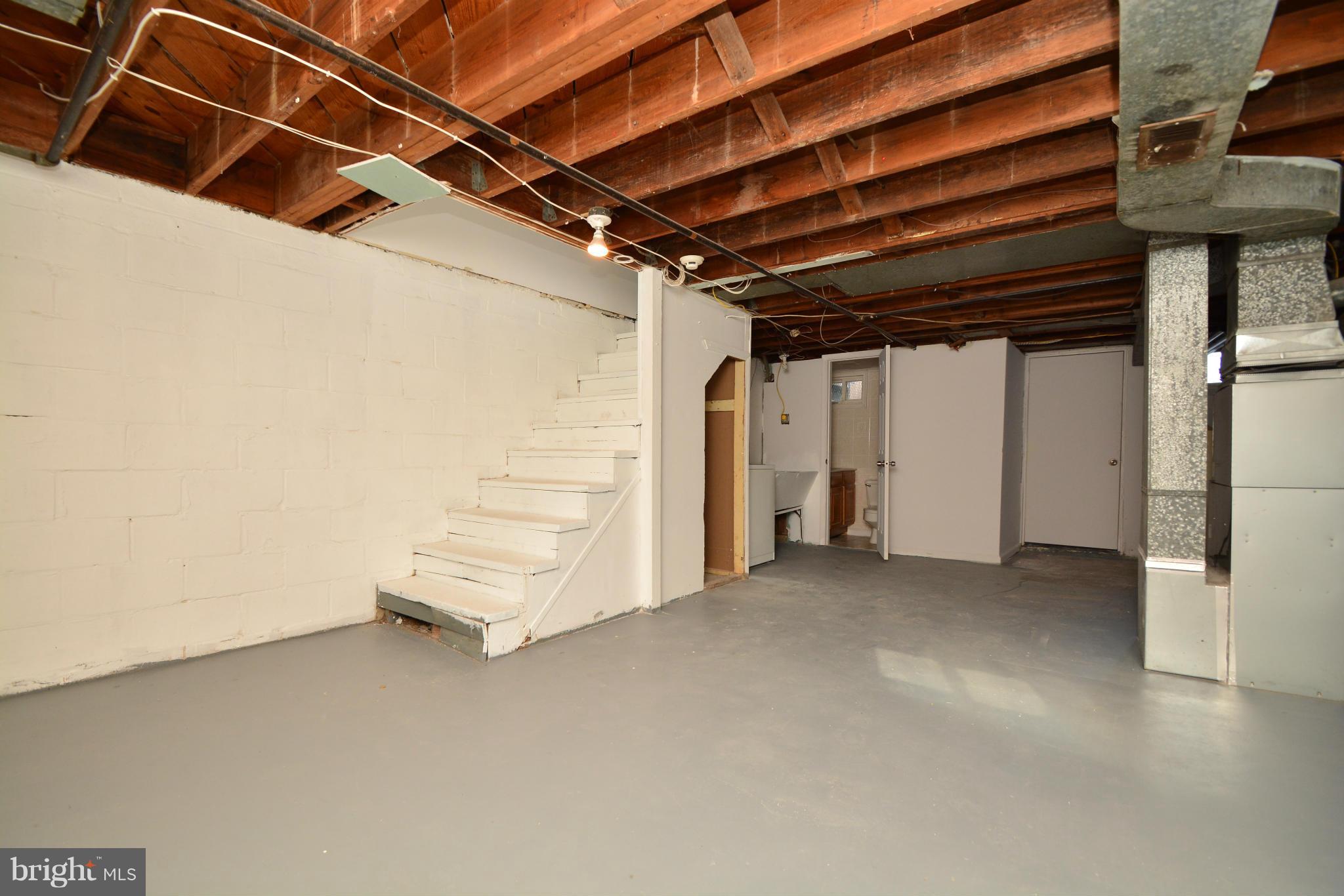 2859 Plainfield Road Dundalk, MD 21222 - Photo 19 of 24 a view of empty room with stairs