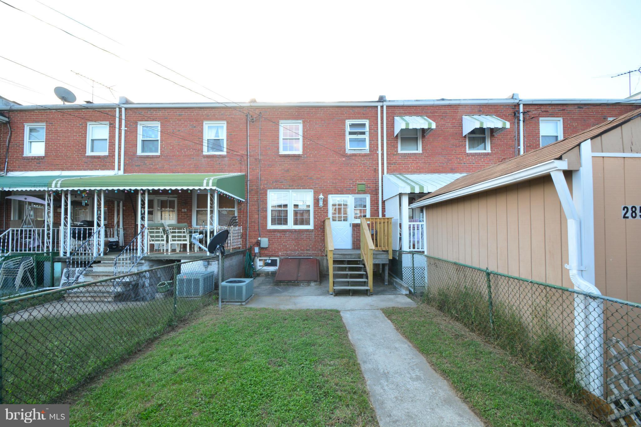 2859 Plainfield Road Dundalk, MD 21222 - Photo 23 of 24 a backyard of a house with yard barbeque oven and outdoor seating