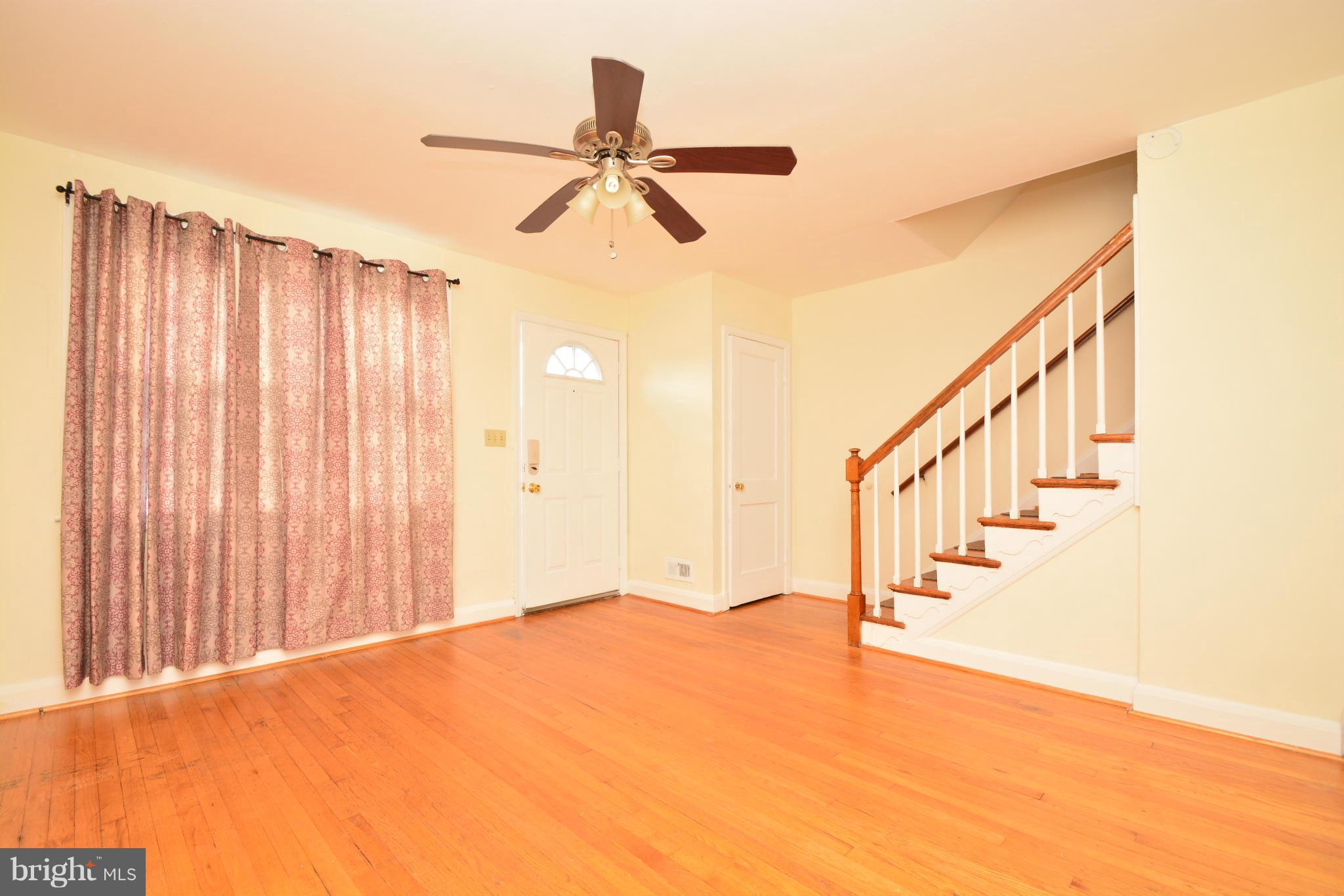 2859 Plainfield Road Dundalk, MD 21222 - Photo 5 of 24 a view of entryway and hall with wooden floor