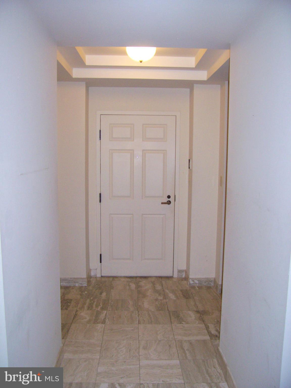 3801 Canterbury Road, Unit 407 Baltimore, MD 21218 - Photo 2 of 16 Foyer Marble