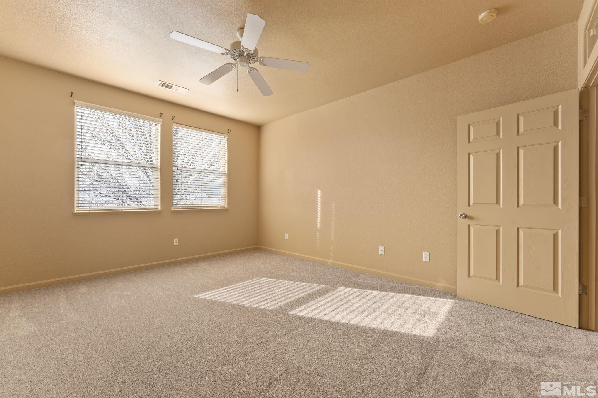 1758 Back Country Court Reno, NV 89521 - Photo 29 of 33 a view of an empty room with a window