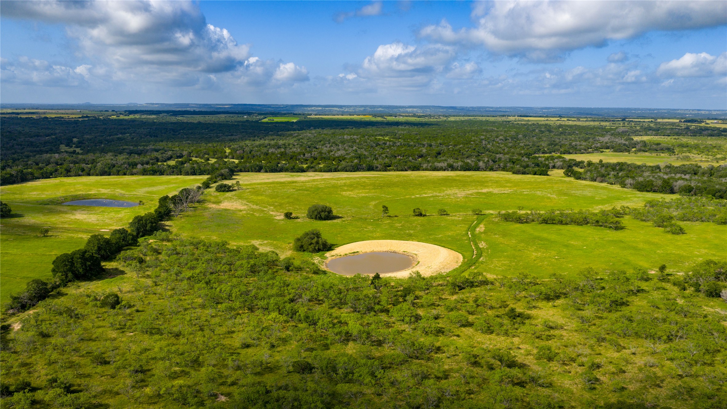 0 County Road 180 Road Purmela, TX 76566 - Photo 18 of 24 a view of a lake with a big yard