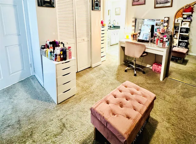 a workspace with furniture and window