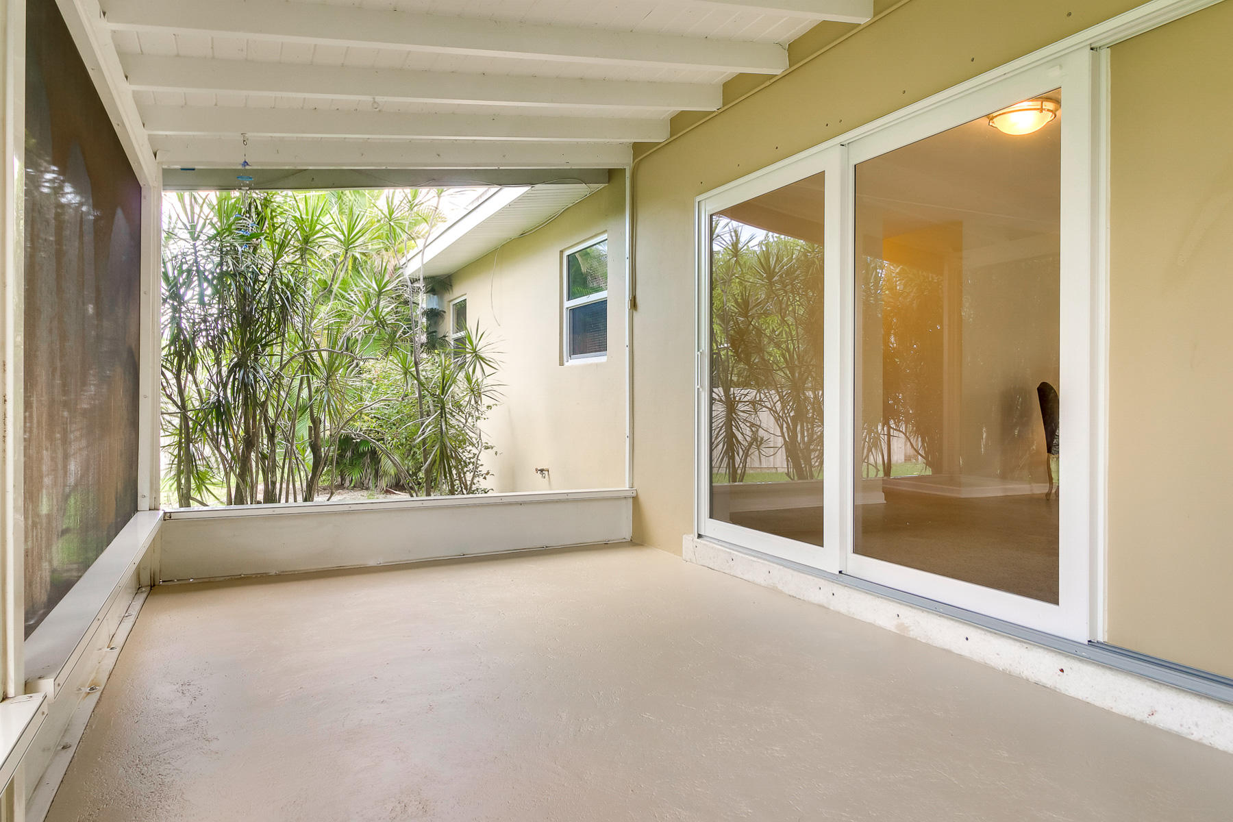 352 East Lake Road Palm Springs, FL 33461 - Photo 22 of 31 a view of a room with window and backyard