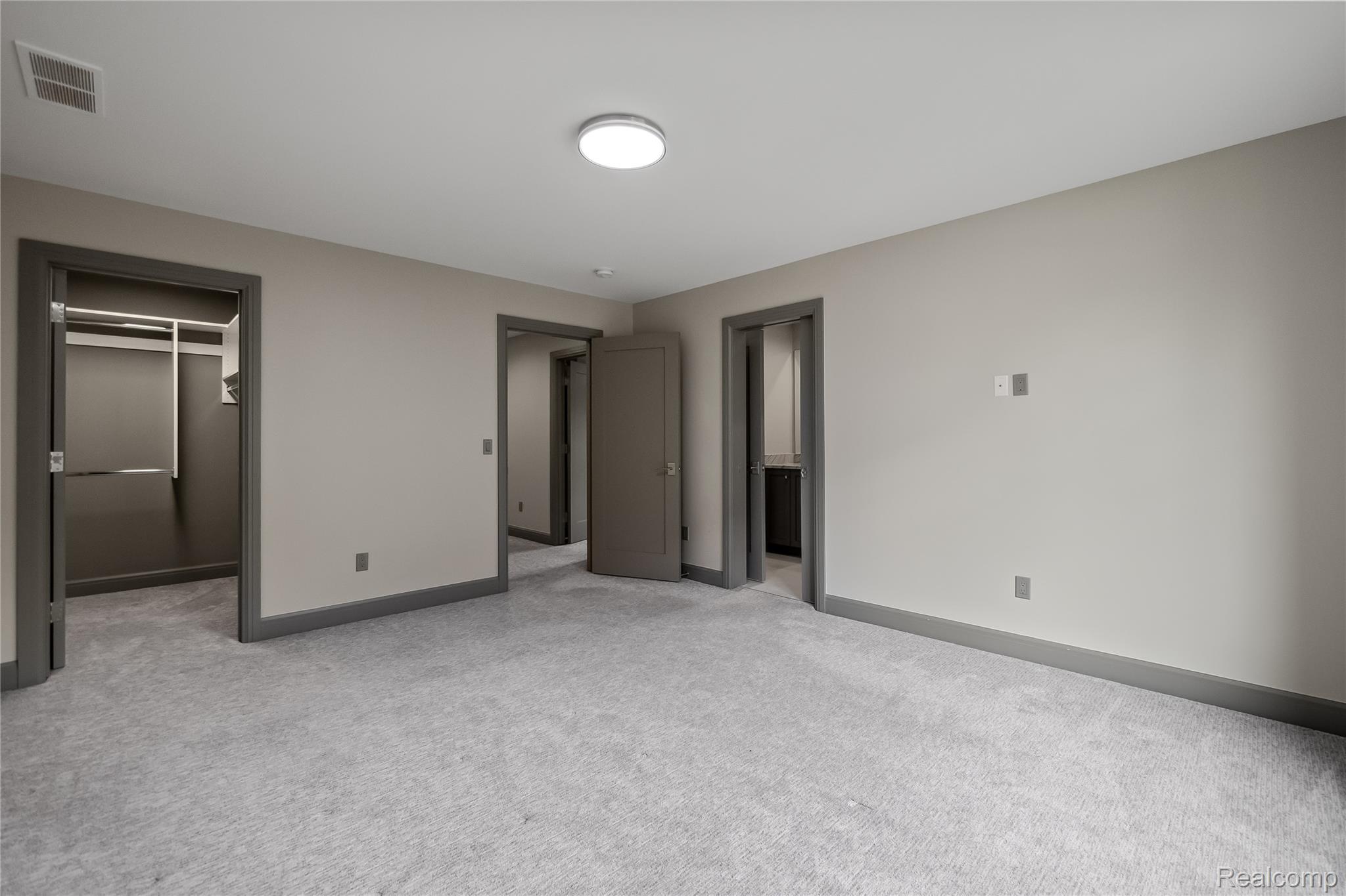 3824 Poppleton Street Troy, MI 48084 - Photo 34 of 51 Unfurnished bedroom with a walk in closet and light colored carpet