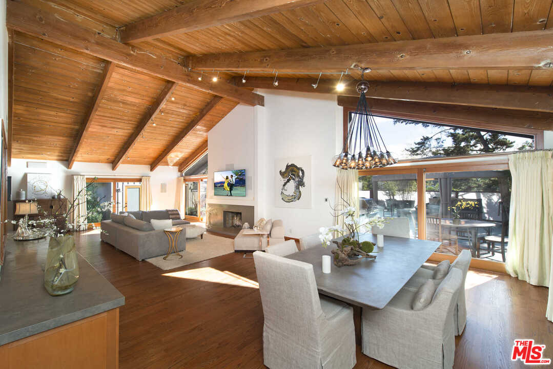 8027 Briar Summit Drive Los Angeles, CA 90046 - Photo 12 of 43 a view of a dining room with furniture