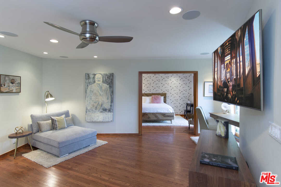 8027 Briar Summit Drive Los Angeles, CA 90046 - Photo 24 of 43 a living room with furniture and a wooden floor