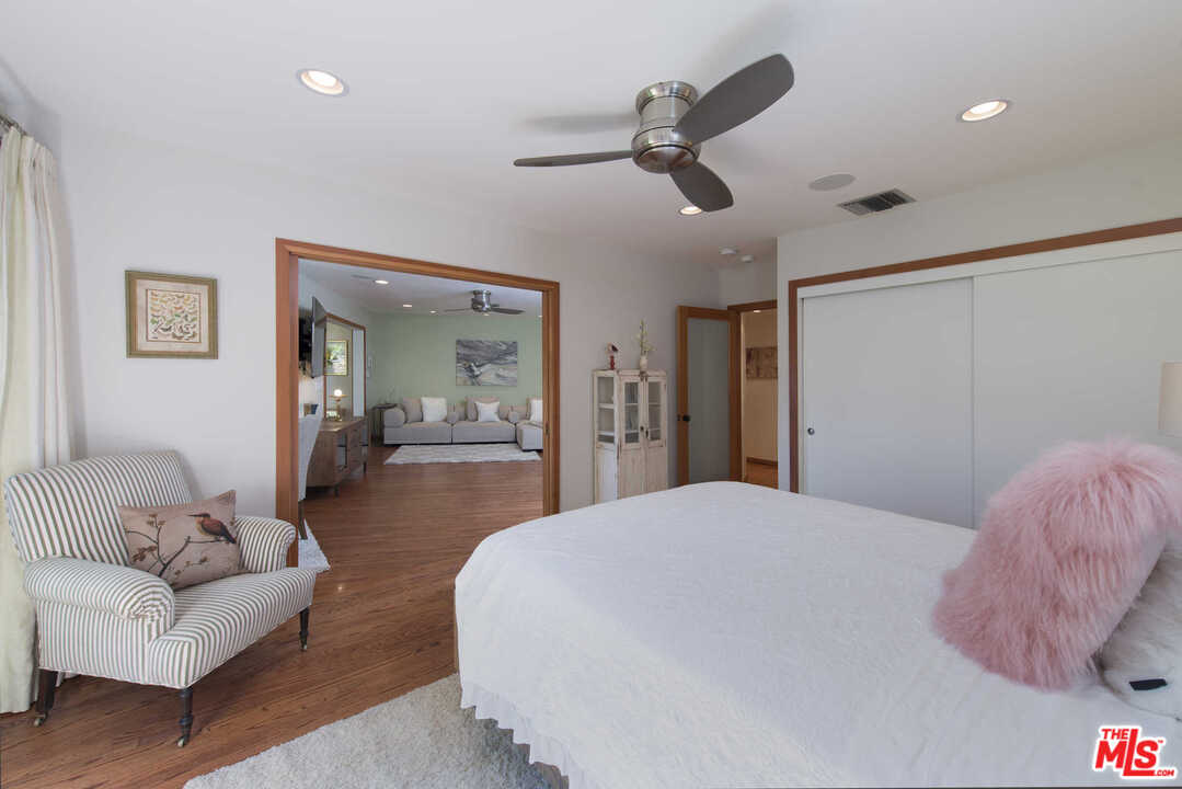 8027 Briar Summit Drive Los Angeles, CA 90046 - Photo 25 of 43 a living room with furniture and a large window