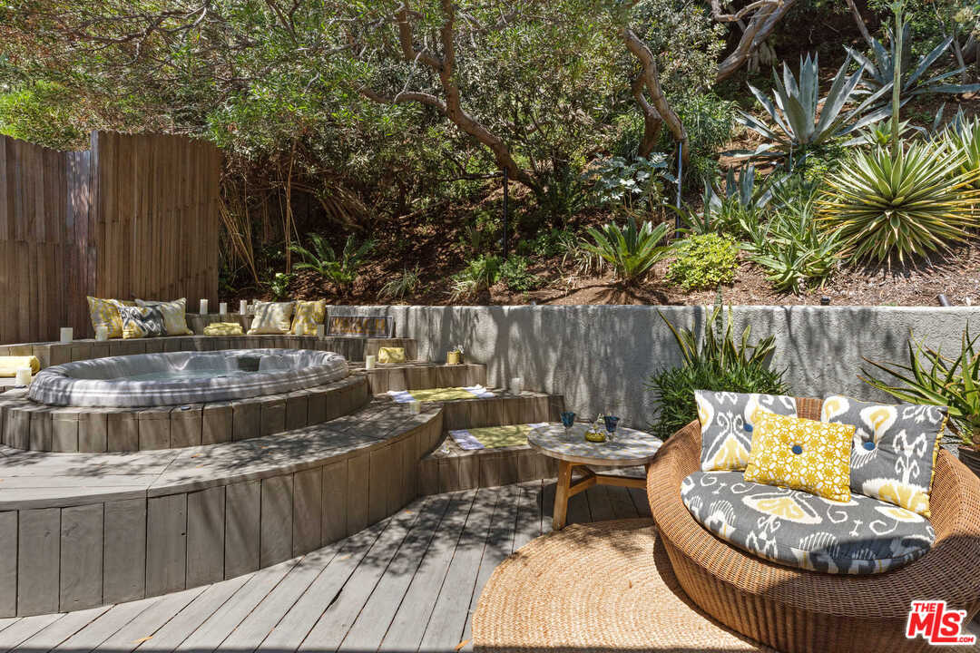 8027 Briar Summit Drive Los Angeles, CA 90046 - Photo 30 of 43 a backyard of a house with barbeque oven