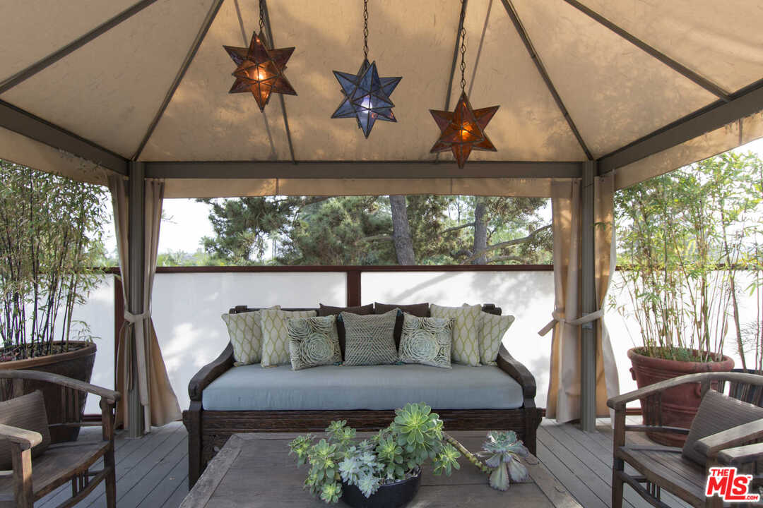 8027 Briar Summit Drive Los Angeles, CA 90046 - Photo 43 of 43 a roof deck with couch