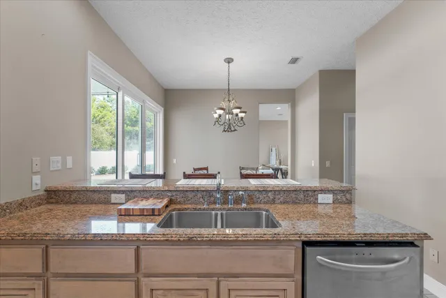 a bathroom with a sink double vanity and a mirror
