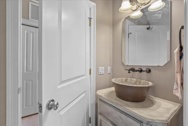 a view of a swimming pool and trees in the background