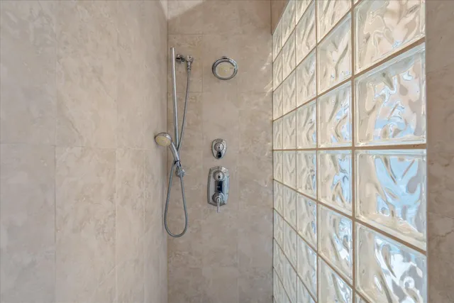 an aerial view of residential houses with outdoor space and street view