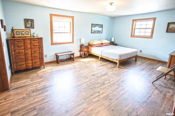 a view of a bathroom with a sink and a mirror