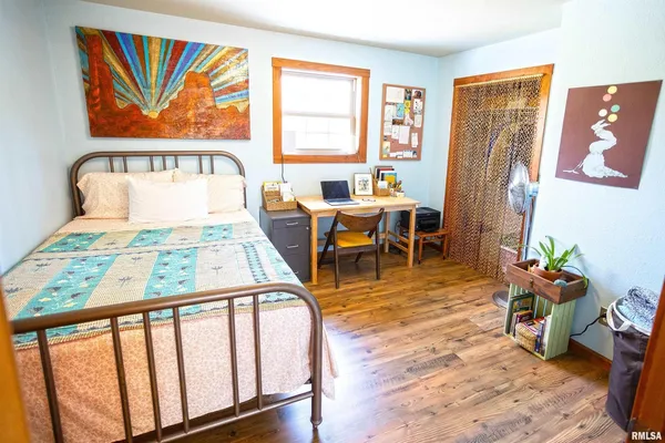 a view of a swimming pool with outdoor seating