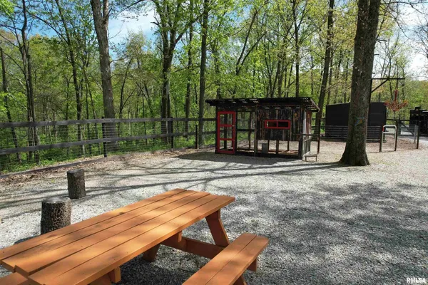 a view of a lake with a yard