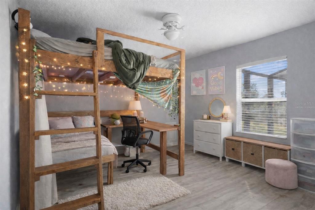 2264 Stone Cross Circle Orlando, FL 32828 - Photo 23 of 45 a bedroom with furniture and a window