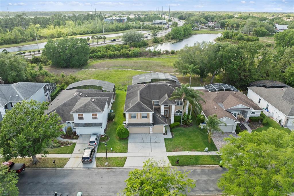 2264 Stone Cross Circle Orlando, FL 32828 - Photo 34 of 45 an aerial view of residential houses with outdoor space and street view