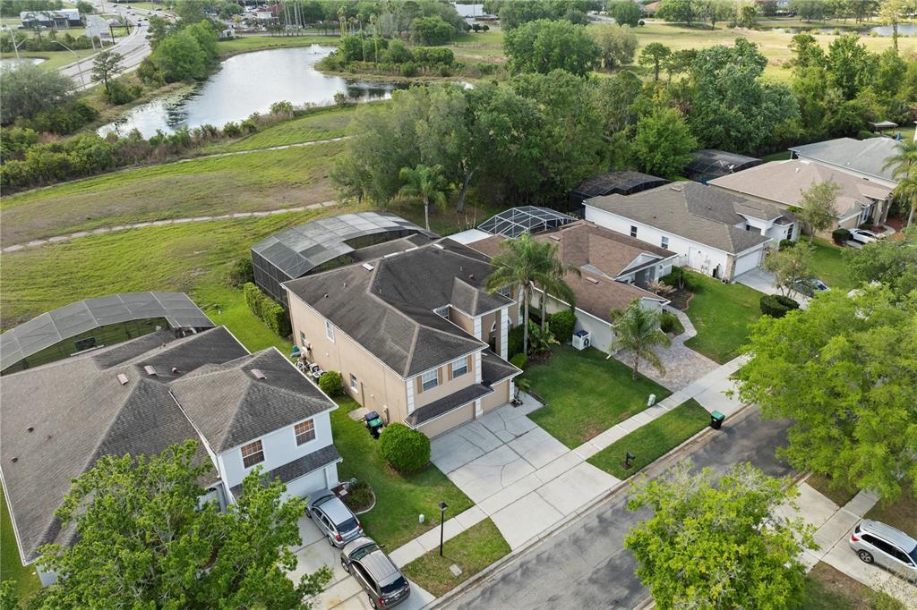 2264 Stone Cross Circle Orlando, FL 32828 - Photo 35 of 45 an aerial view of a house with garden space and lake view
