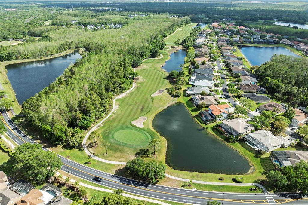 2264 Stone Cross Circle Orlando, FL 32828 - Photo 45 of 45 an aerial view of a residential houses with outdoor space and street view