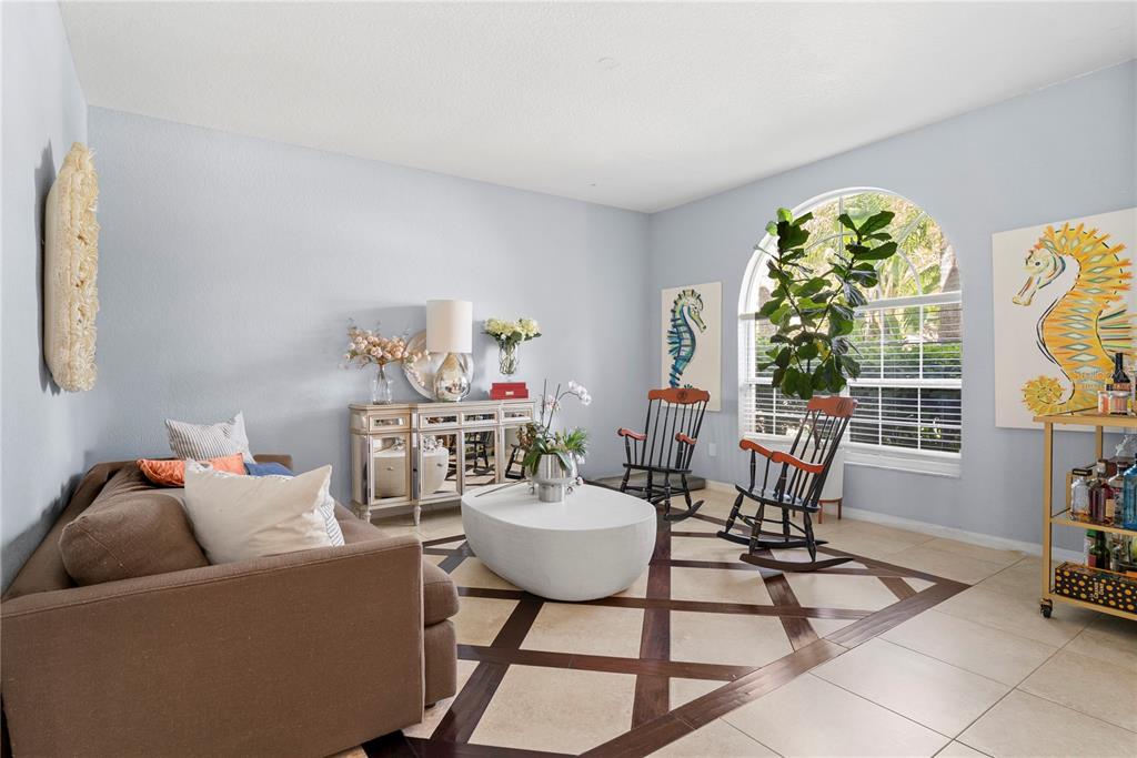 2264 Stone Cross Circle Orlando, FL 32828 - Photo 8 of 45 a living room with furniture and a potted plant
