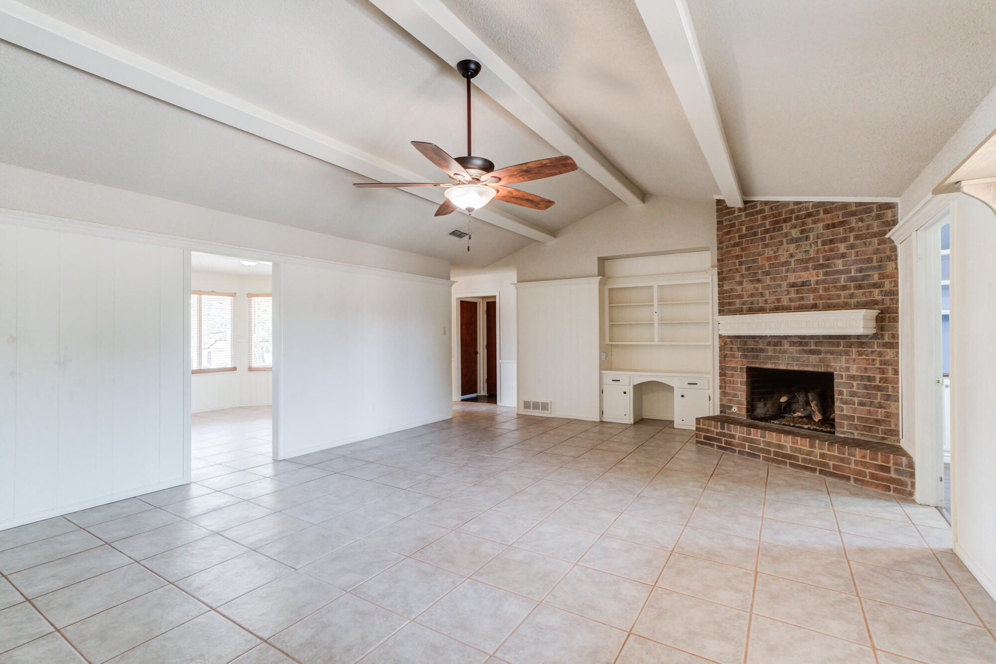 26 Highland Drive Ransom Canyon, TX 79366 - Photo 25 of 53 a view of an empty room with a fireplace