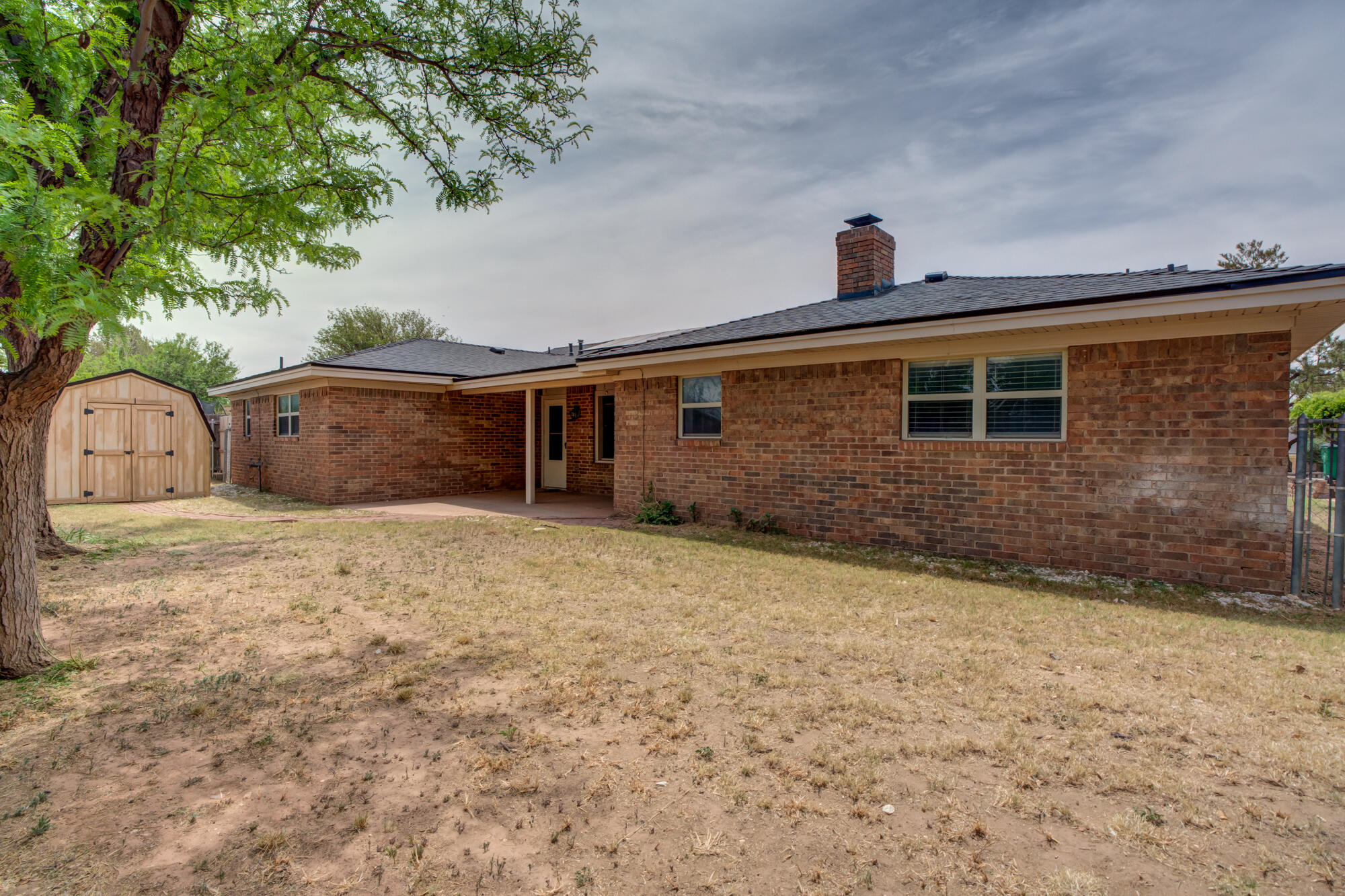 26 Highland Drive Ransom Canyon, TX 79366 - Photo 44 of 53 a front view of a house with a yard