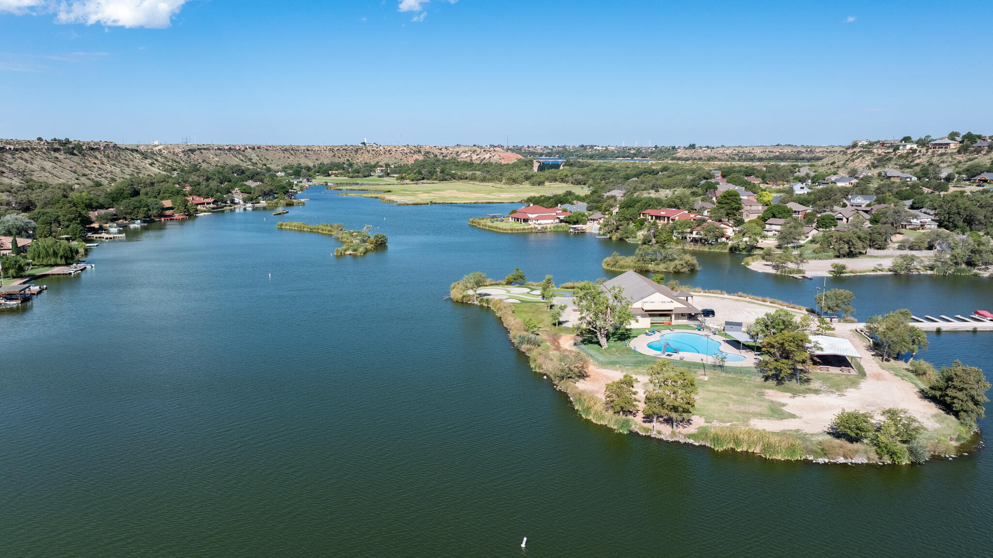 26 Highland Drive Ransom Canyon, TX 79366 - Photo 5 of 53 an aerial view of a house with a lake view