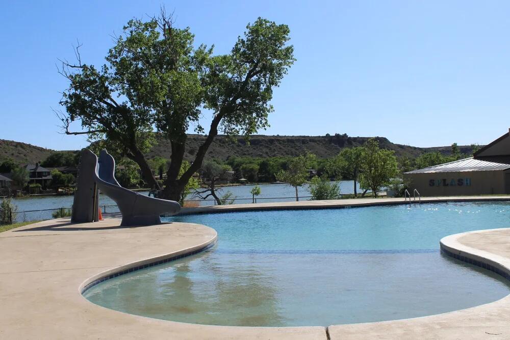 26 Highland Drive Ransom Canyon, TX 79366 - Photo 6 of 53 a view of a swimming pool with a lake view and mountain view