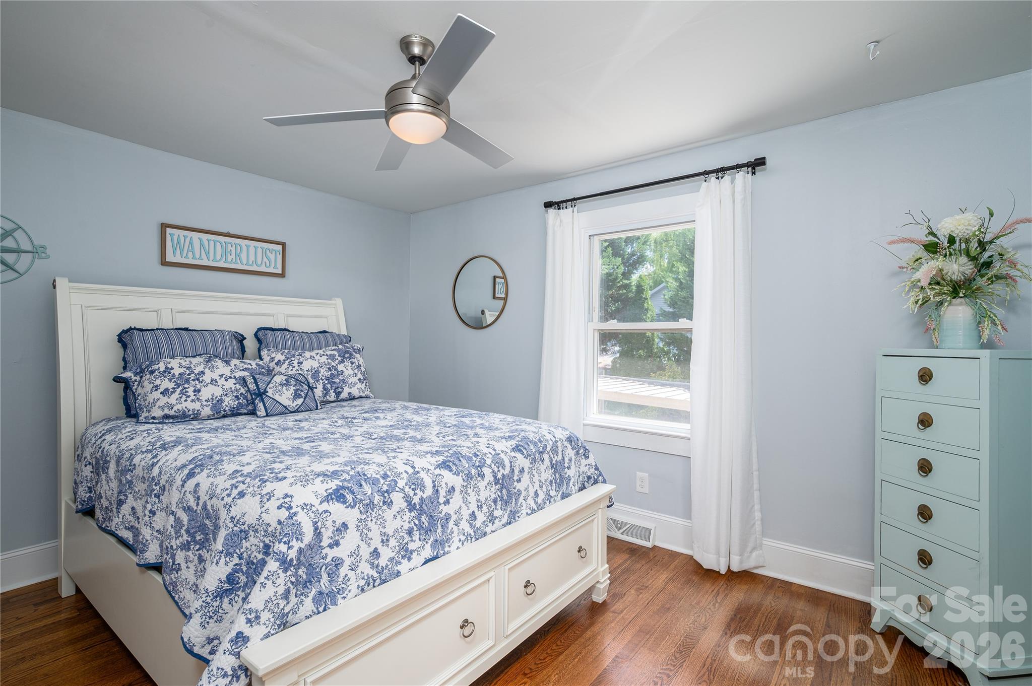 58 Fourth Street Cramerton, NC 28032 - Photo 26 of 44 a bedroom with a bed and a window