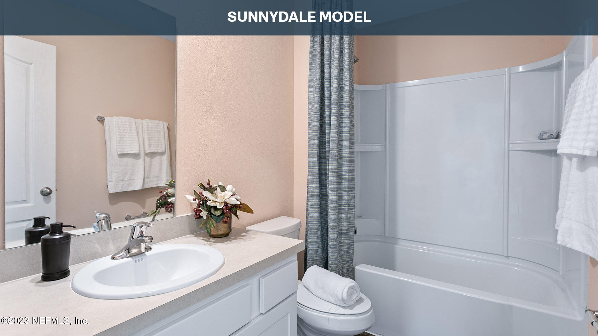 12684 European Beech Road Jacksonville, FL 32218 - Photo 16 of 36 a bathroom with a sink toilet and shower