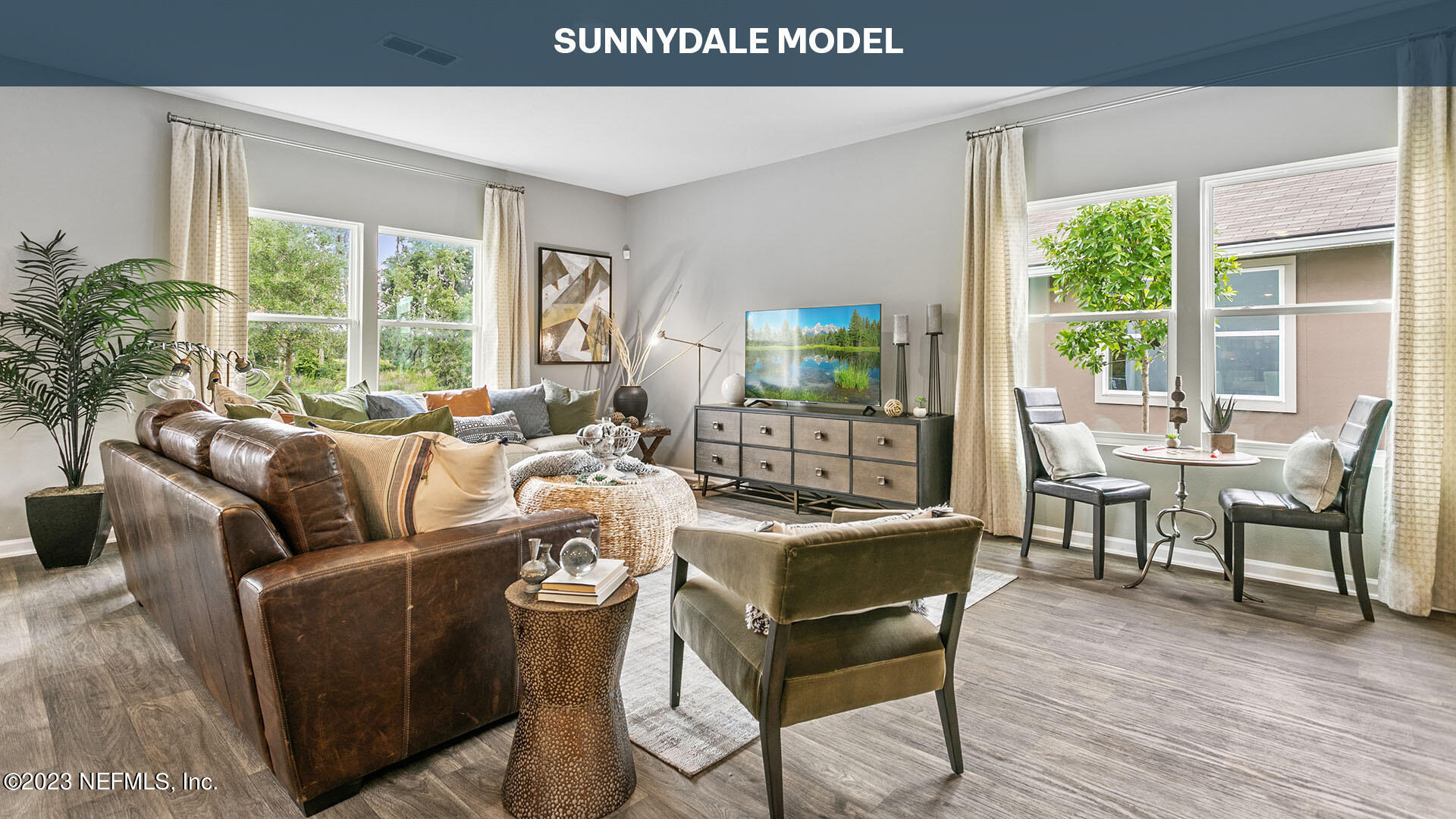 12684 European Beech Road Jacksonville, FL 32218 - Photo 7 of 36 a living room with furniture and a large window