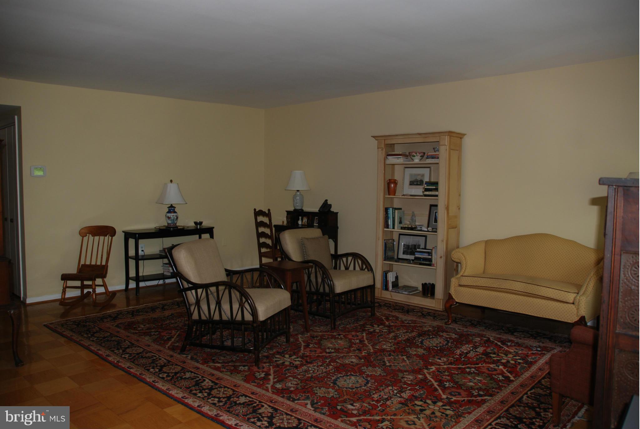 107 Cross Keys Road, Unit R107E Baltimore, MD 21210 - Photo 7 of 14 a living room with furniture